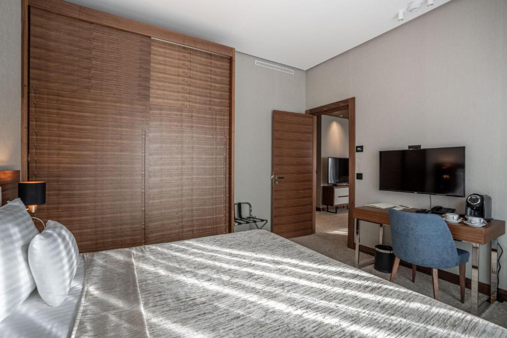 TV a/nebo společenská místnost v ubytování Hotel Tonanti