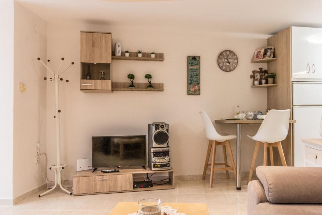 Kuchyň nebo kuchyňský kout v ubytování Anastasia Residence Sea View