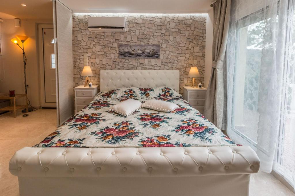 Postel nebo postele na pokoji v ubytování Anastasia Residence Sea View