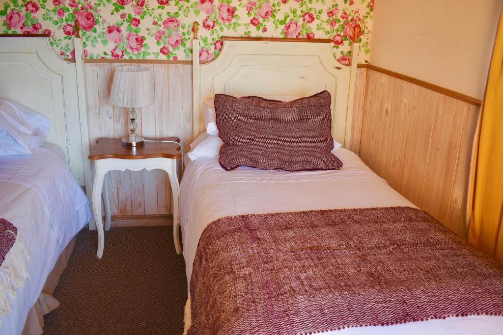 Uma cama ou camas num quarto em Hotel & Apart Hotel Monte Verde