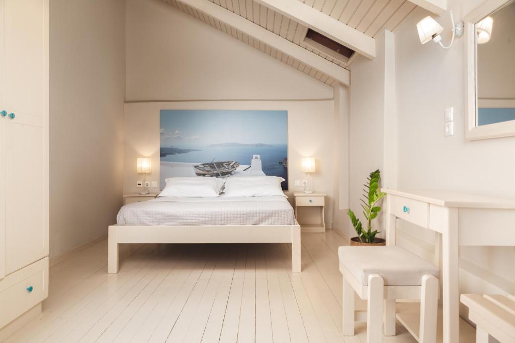 Ein Bett oder Betten in einem Zimmer der Unterkunft Pierros Hotel