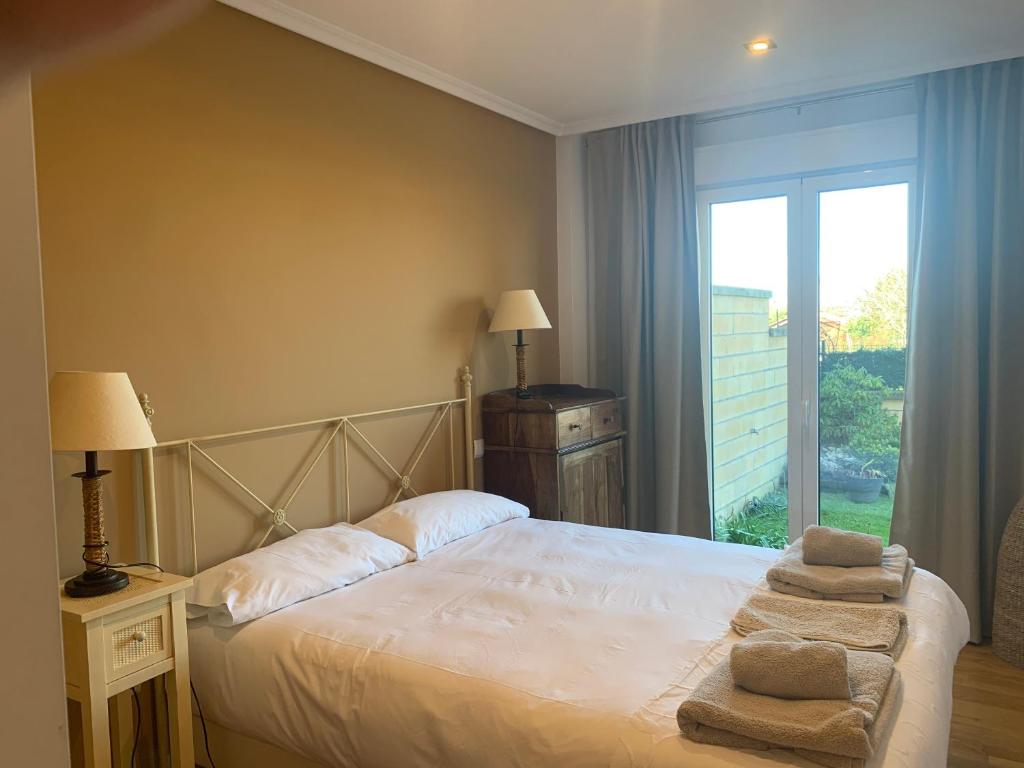 Apartamentos apartamento con jardín privado y barbacoa a 5 min playas santander en Santander, Cantabria