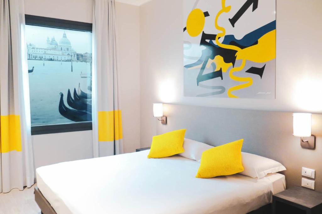 Postel nebo postele na pokoji v ubytování AN Hotel Dépendance Milano Melegnano