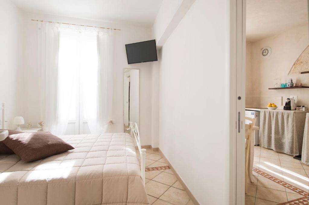 Posteľ alebo postele v izbe v ubytovaní Dimora Pace - ApulianStay Group