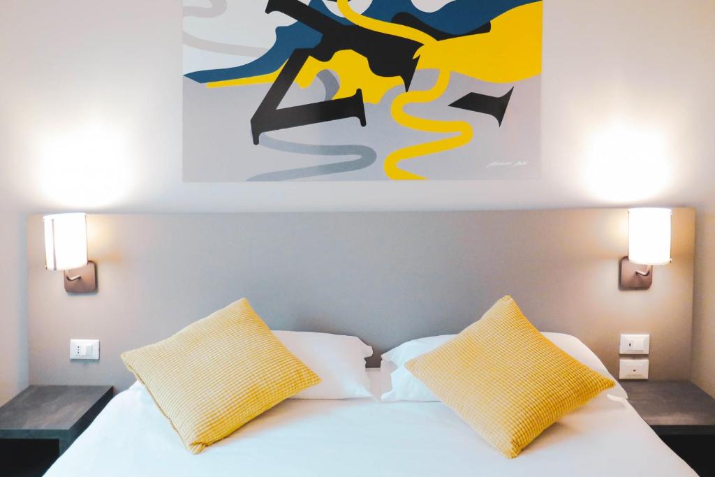 Postel nebo postele na pokoji v ubytování AN Hotel Dépendance Milano Melegnano