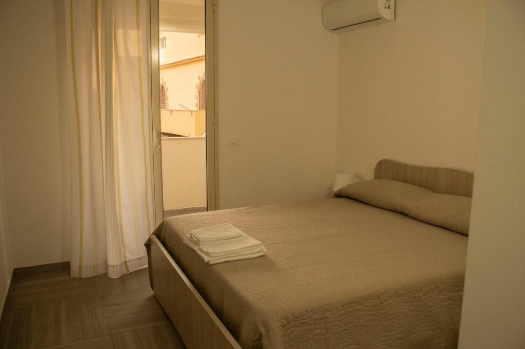 Postel nebo postele na pokoji v ubytování B&b villa Arena