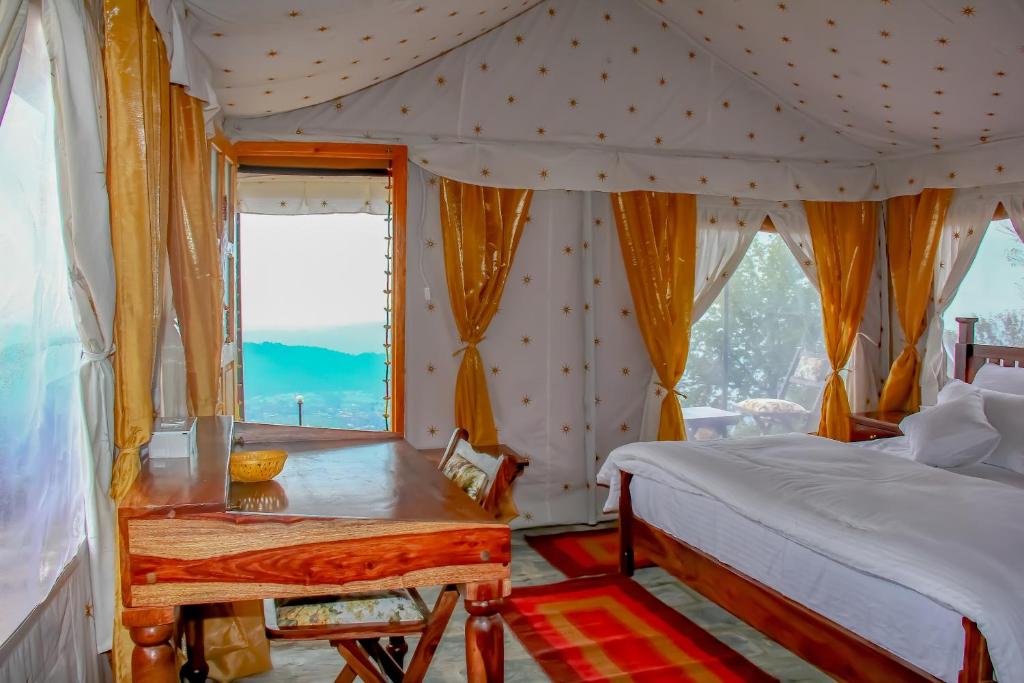 Postel nebo postele na pokoji v ubytování CBB - Camp Bir Billing