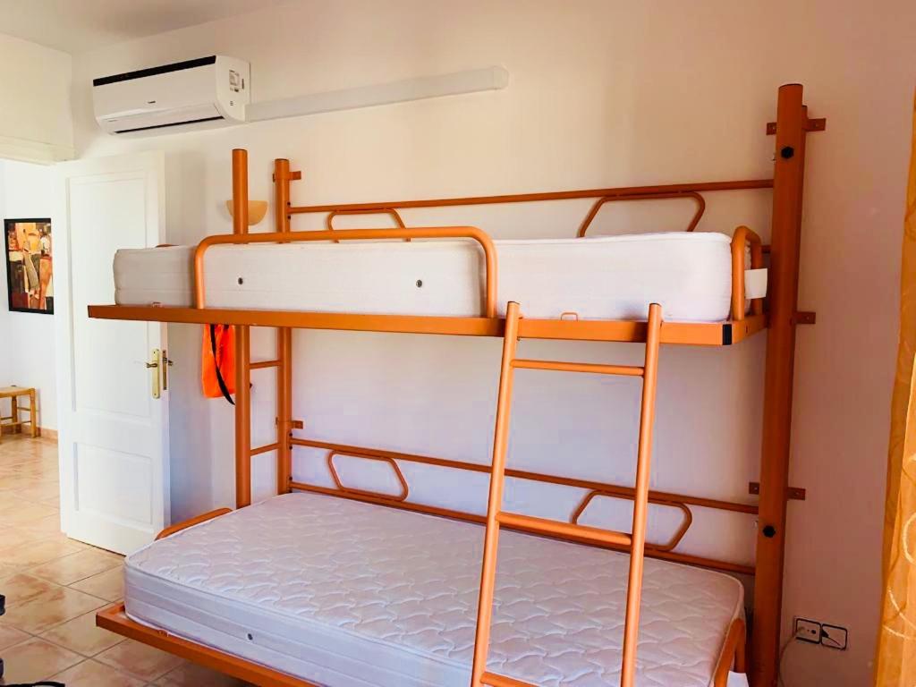 Postel nebo postele na pokoji v ubytování Villas2meet Mallorca