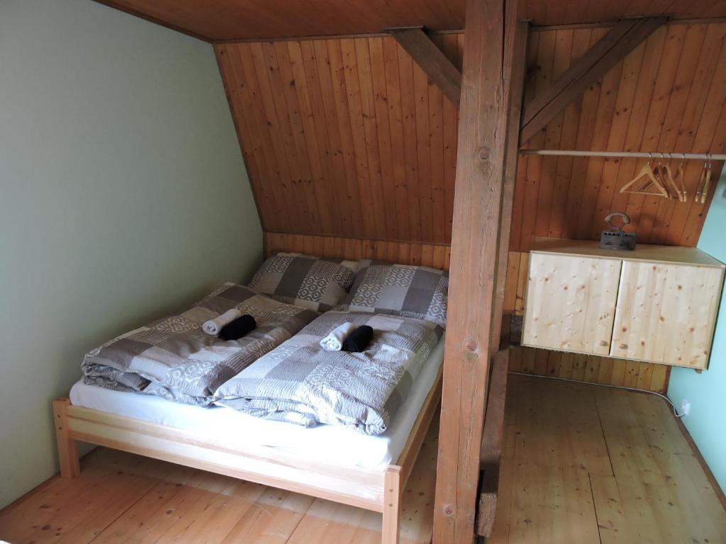 Postel nebo postele na pokoji v ubytování Apartmány Na Lontě