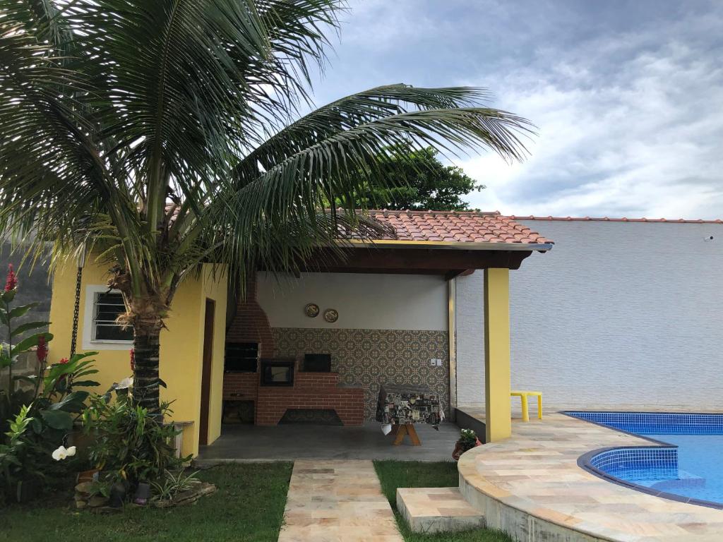  CASA C/ 3 QUARTOS PISCINA E AR CONDICIONADO