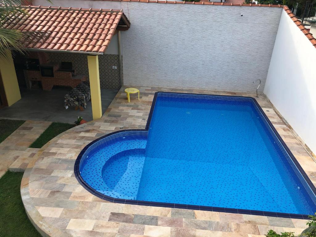  CASA C/ 3 QUARTOS PISCINA E AR CONDICIONADO