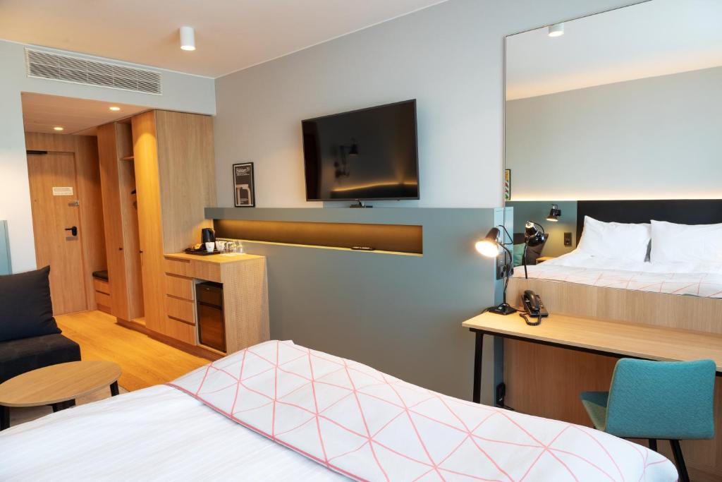 Postel nebo postele na pokoji v ubytování Holiday Inn Helsinki - Expo by IHG
