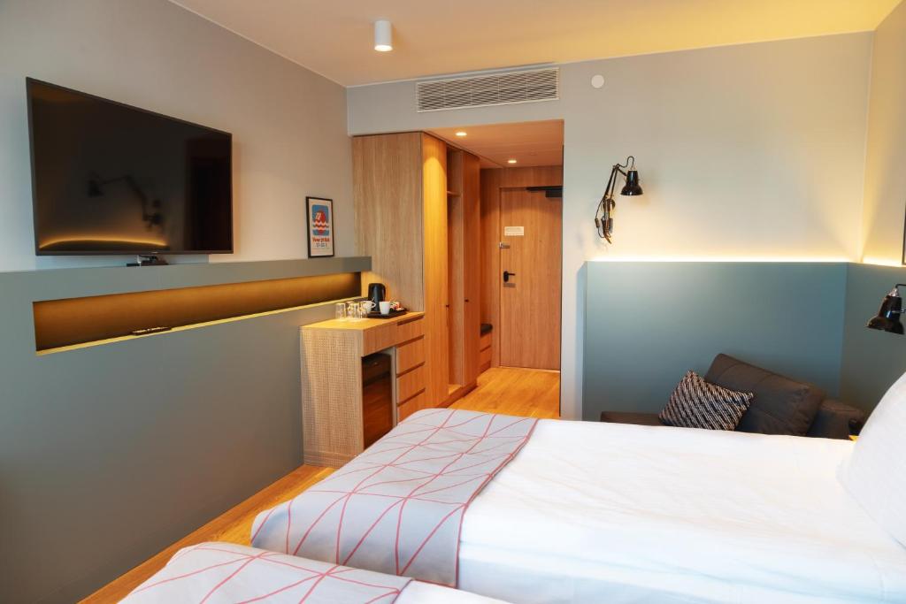 Postel nebo postele na pokoji v ubytování Holiday Inn Helsinki - Expo by IHG