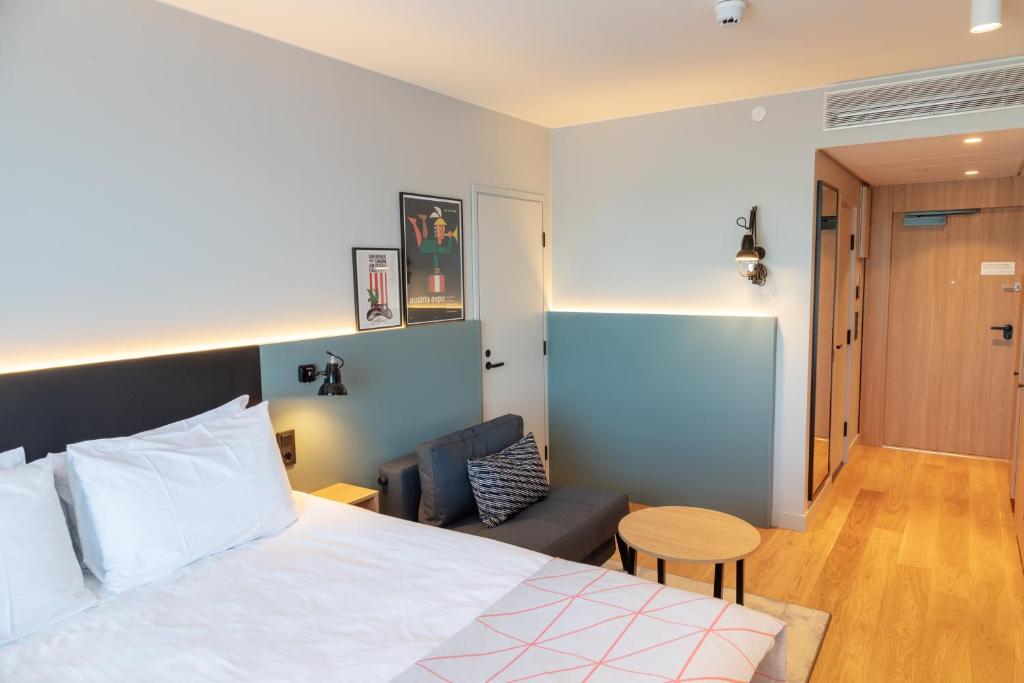 Postel nebo postele na pokoji v ubytování Holiday Inn Helsinki - Expo by IHG