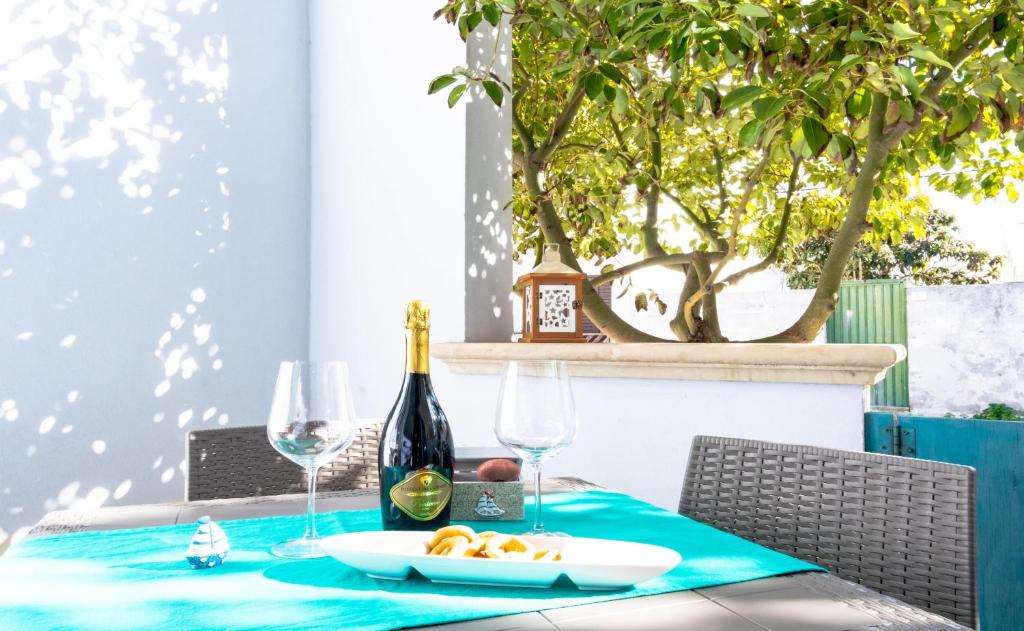 Nápoje v ubytovaní Luxury Apartments - Torre San Giovanni