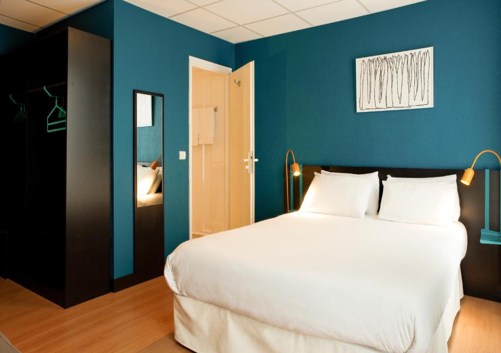 Una cama o camas en una habitaci&oacute;n de Hotel Daval