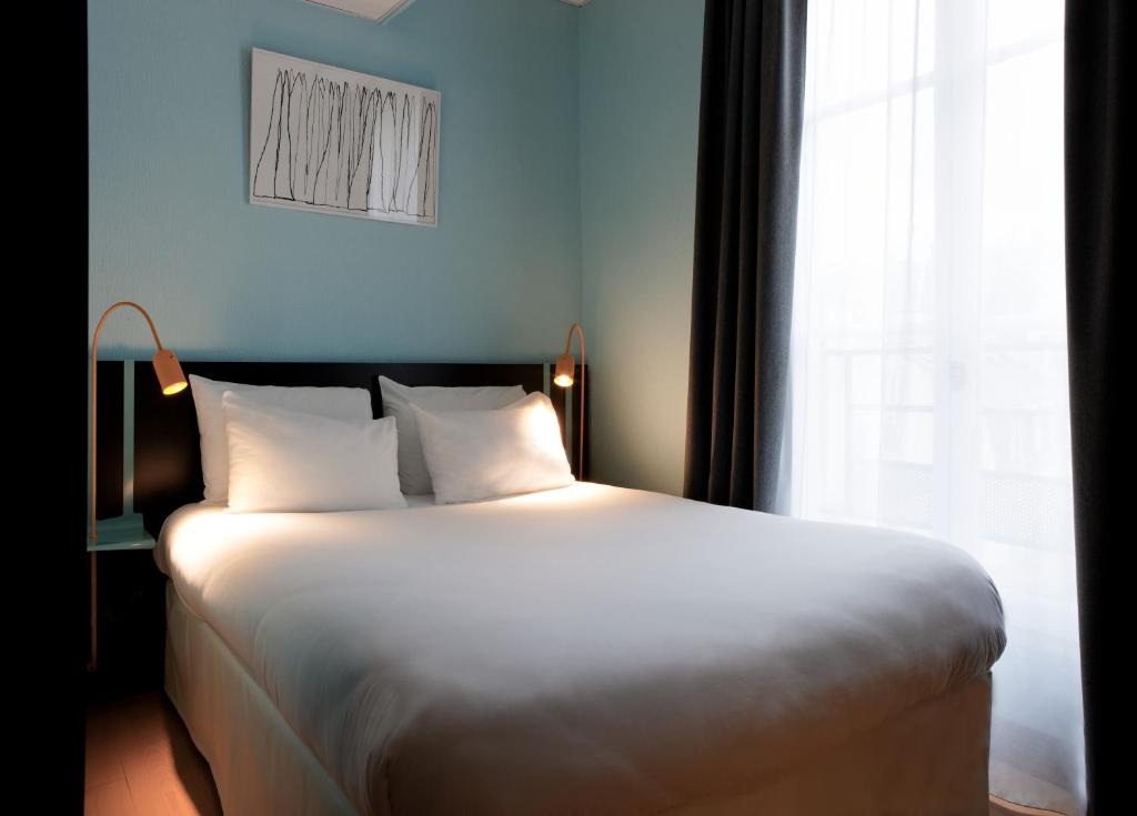 Una cama o camas en una habitaci&oacute;n de Hotel Daval