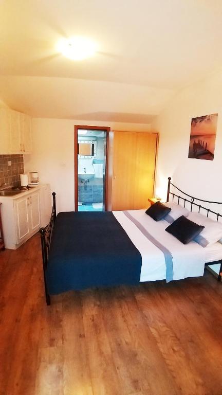 Кровать или кровати в номере Sunny day Rovinj