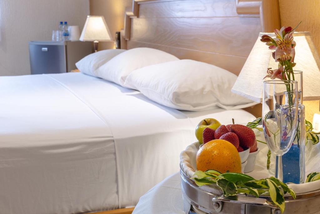Postel nebo postele na pokoji v ubytování Tecnohotel Itzáes