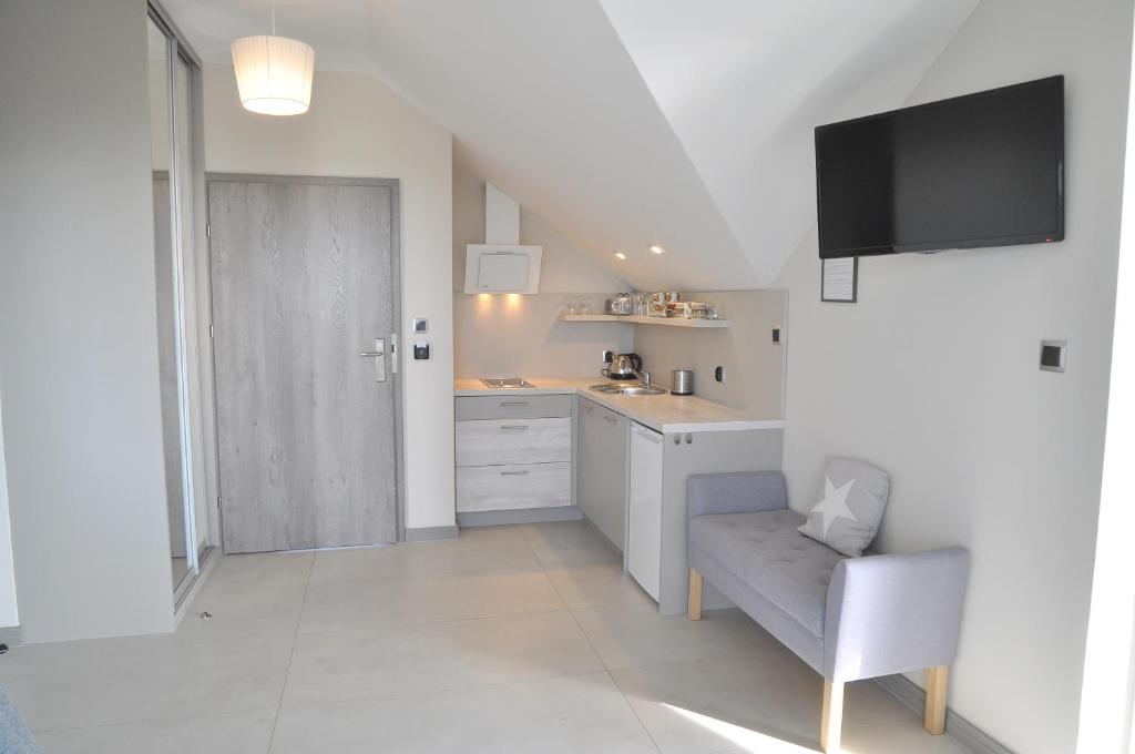 Kuchyňa alebo kuchynka v ubytovaní Willa Dobryłko II -Apartamenty