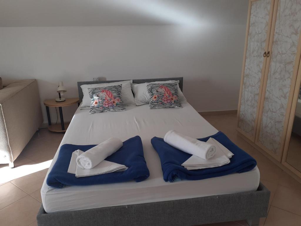 Postel nebo postele na pokoji v ubytování Villa Palfi