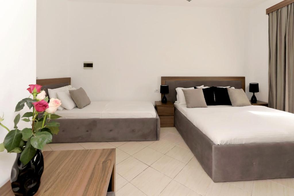 Letto o letti in una camera di Villa Doka