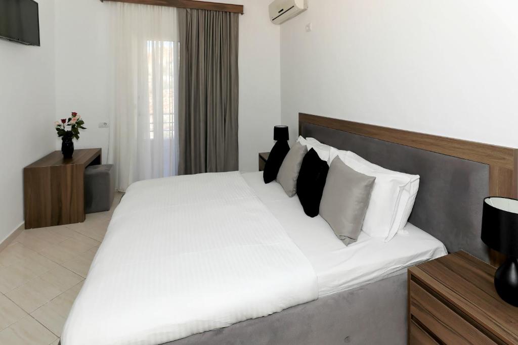 Letto o letti in una camera di Villa Doka