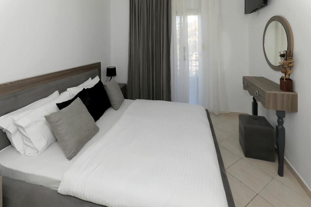 Letto o letti in una camera di Villa Doka