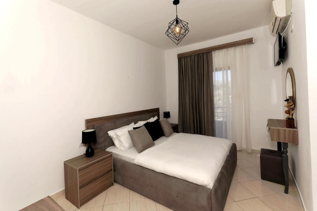Letto o letti in una camera di Villa Doka