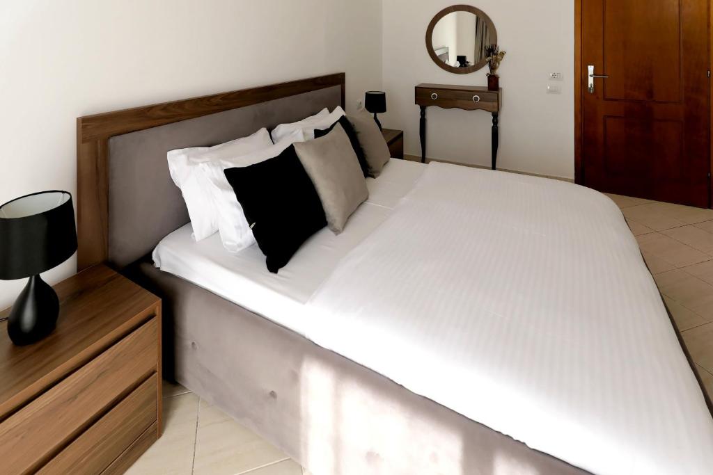 Letto o letti in una camera di Villa Doka