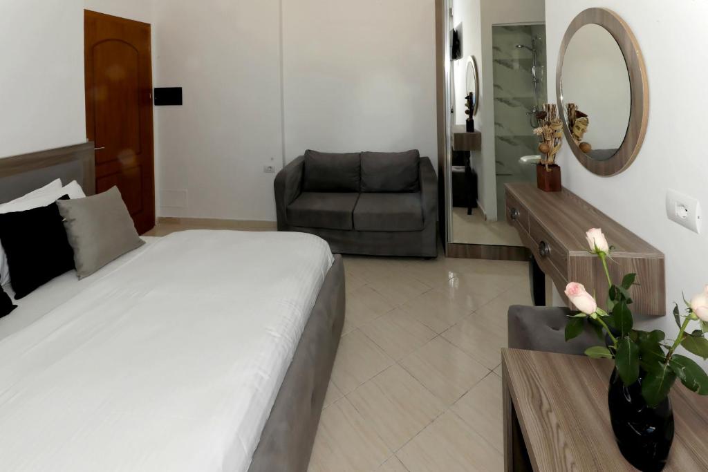 Letto o letti in una camera di Villa Doka