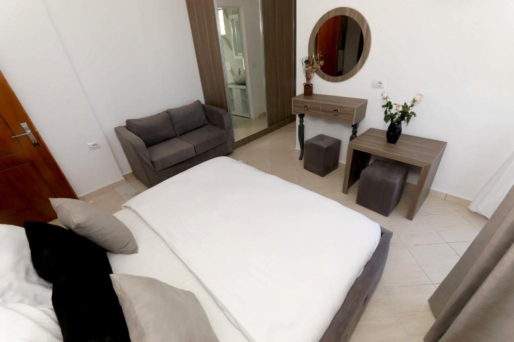 Letto o letti in una camera di Villa Doka