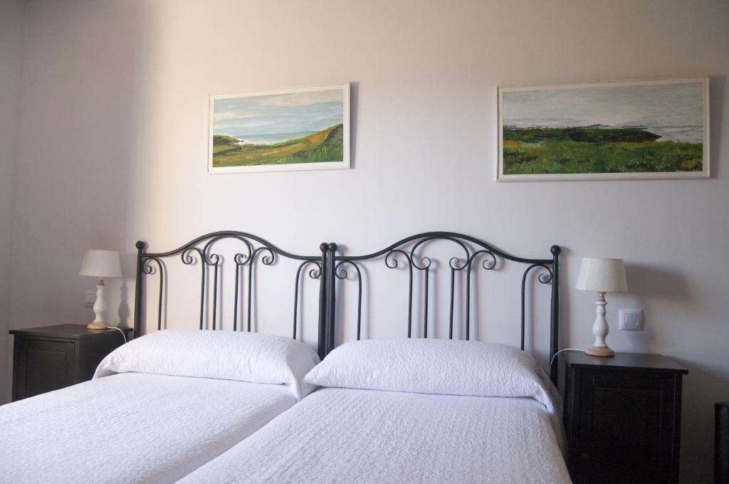 Postel nebo postele na pokoji v ubytování Apartamentos Corona
