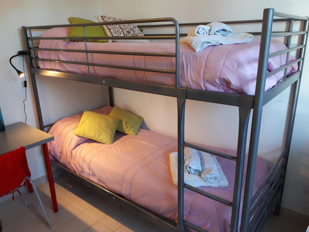 Łóżko lub łóżka w pokoju w obiekcie Bellavista - Pescara colli