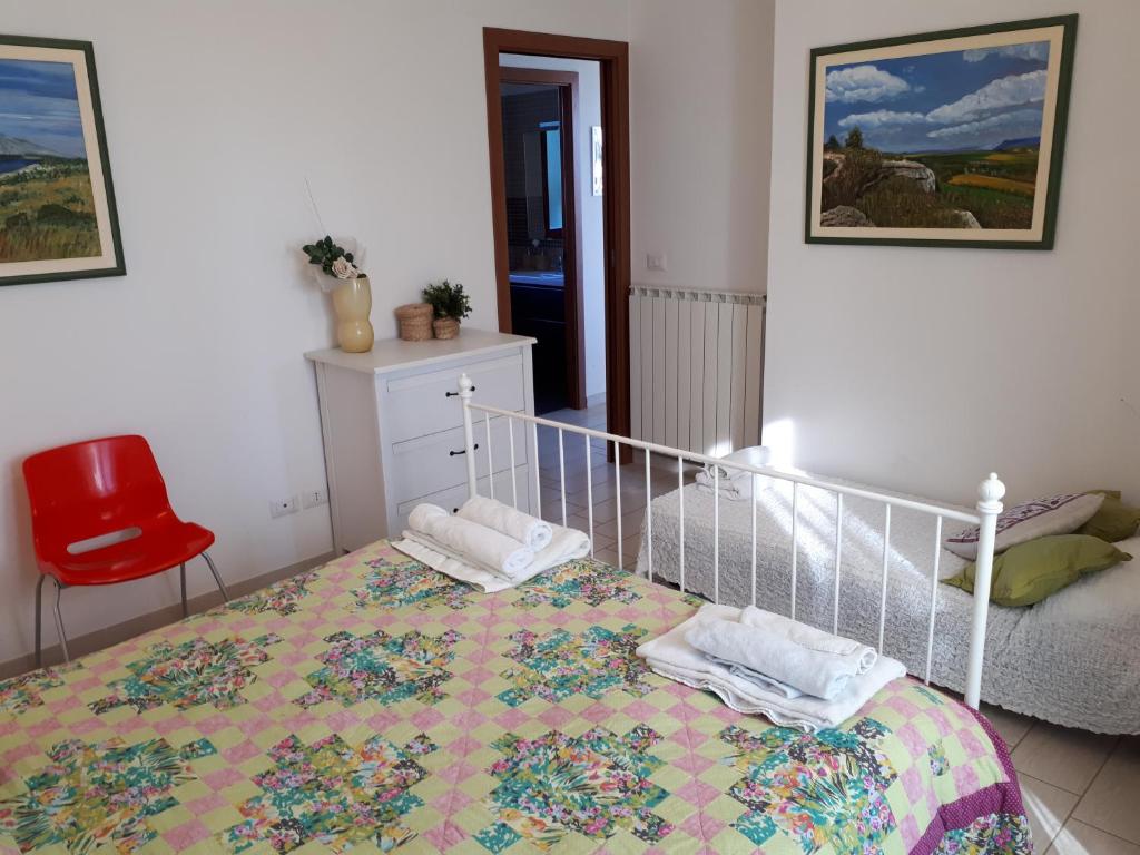 Łóżko lub łóżka w pokoju w obiekcie Bellavista - Pescara colli