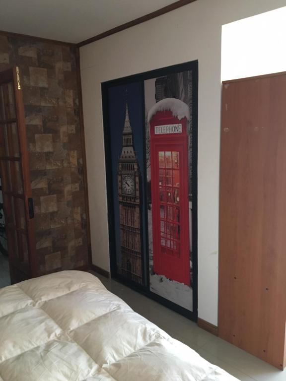 Una cama o camas en una habitación de HOSTAL CAUQUENES