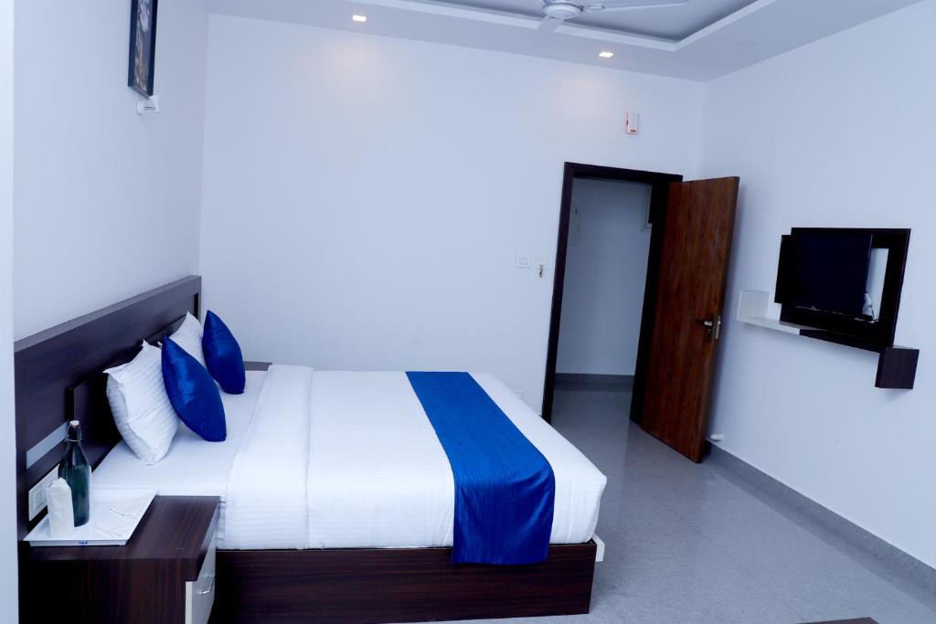 Postel nebo postele na pokoji v ubytování Casillda Munnar