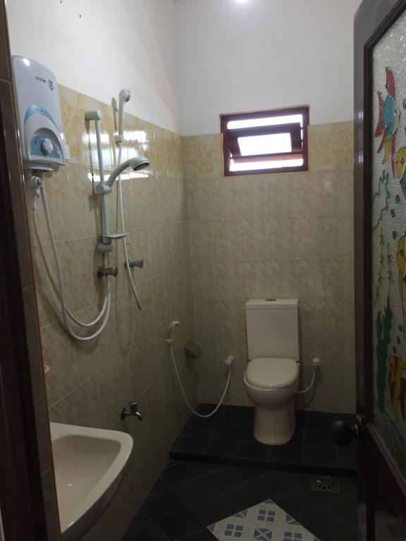 Koupelna v ubytování Diwanka Villa