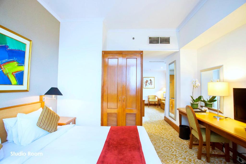Menara Peninsula Hotel - Studio-Doppelzimmer
