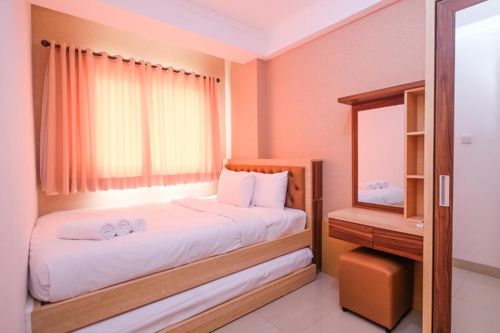 Ένα ή περισσότερα κρεβάτια σε δωμάτιο στο 1BR Apartment for 3 Pax at Signature Park Grande By Travelio