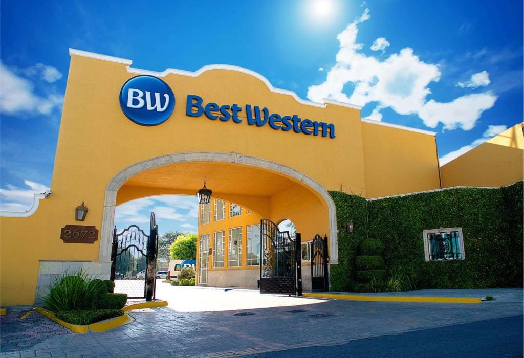 a yellow building with a buy best western sign on it at Best Western Saltillo in Saltillo