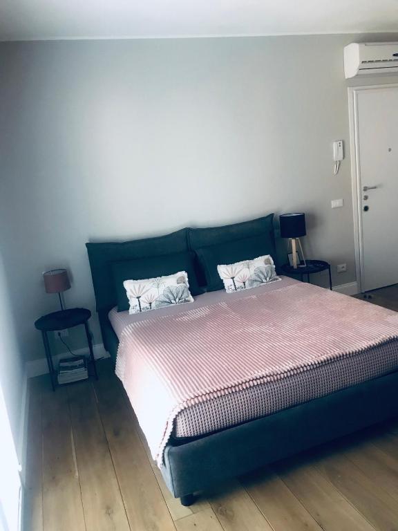 Postel nebo postele na pokoji v ubytování ML32