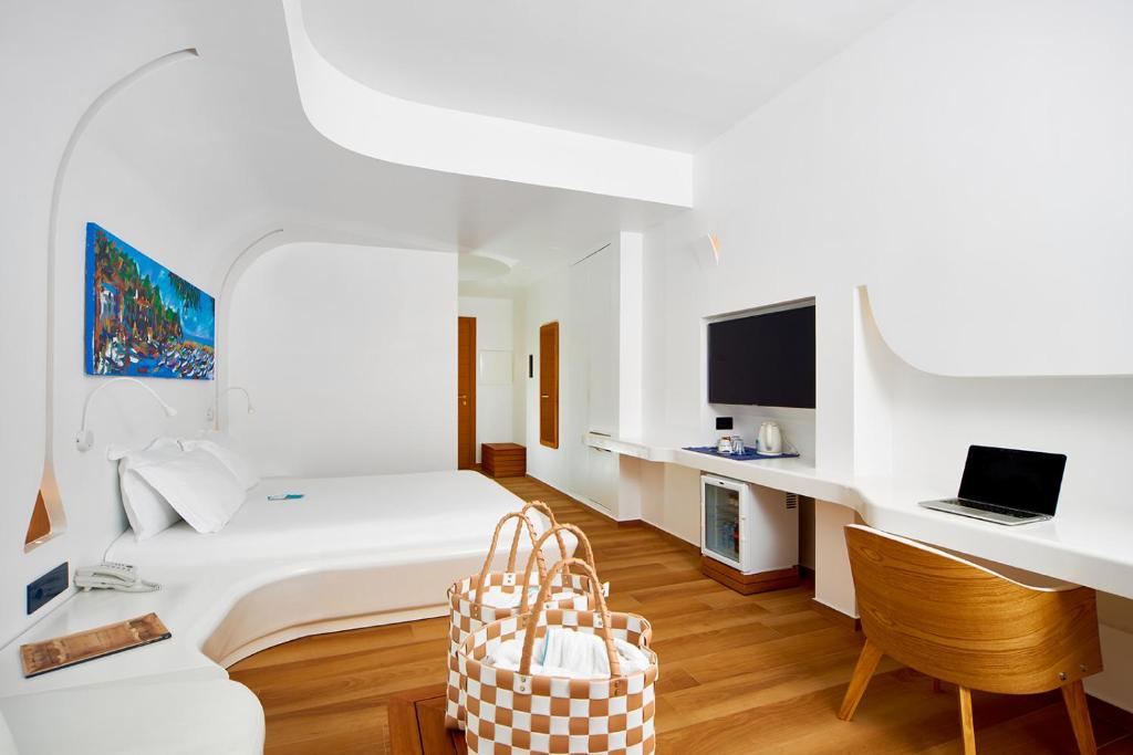 TV a/nebo společenská místnost v ubytování Approdo Resort Thalasso Spa