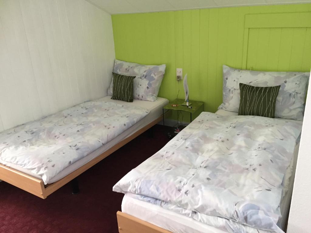 Postel nebo postele na pokoji v ubytování Hotel Garni Villa del Sole
