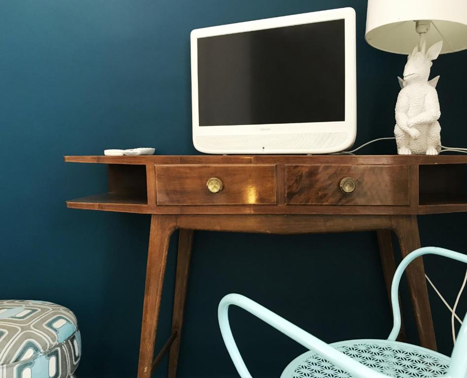 TV a/nebo společenská místnost v ubytování BAD - B&B And Design