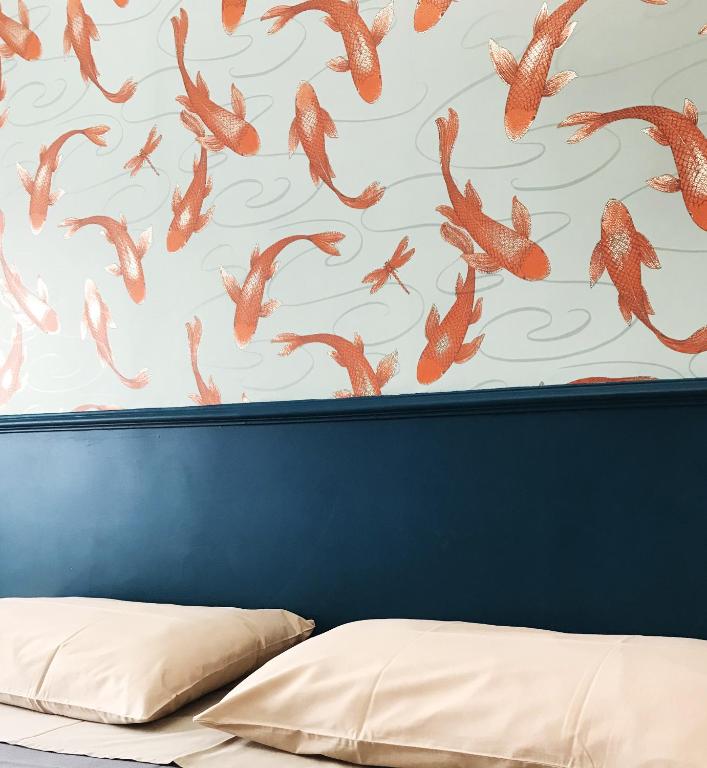 Postel nebo postele na pokoji v ubytování BAD - B&B And Design