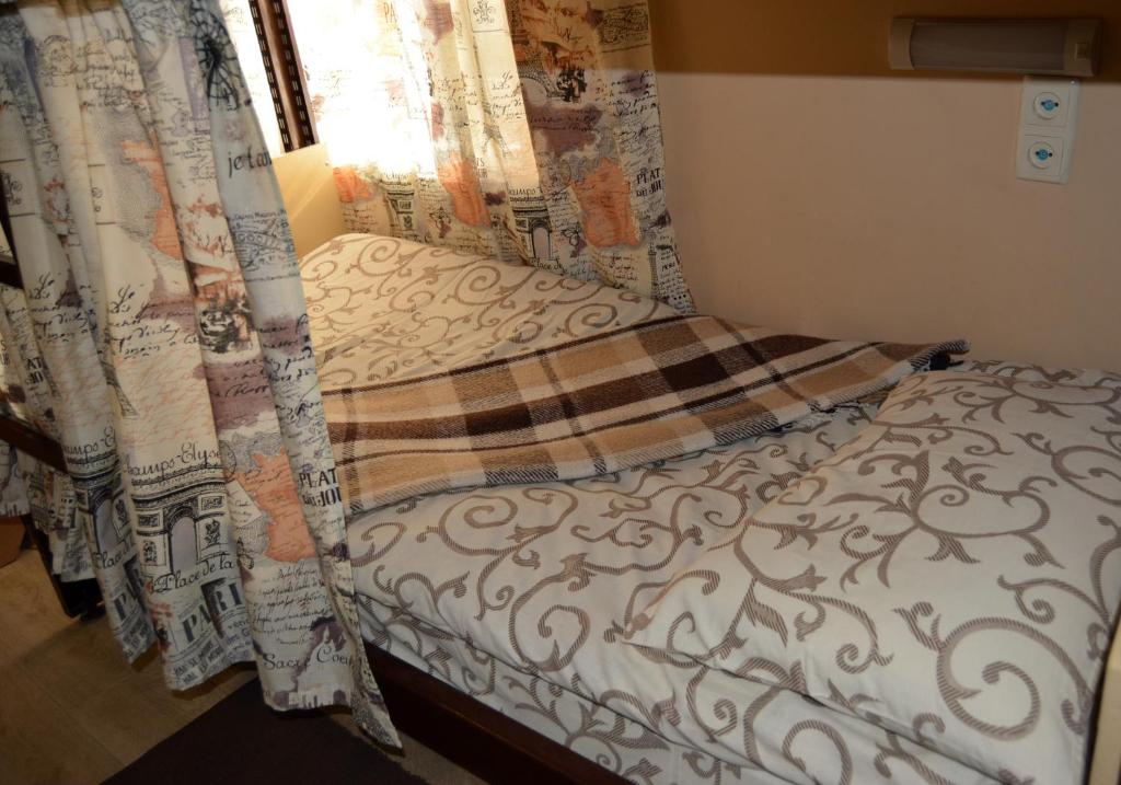 Postel nebo postele na pokoji v ubytování Sweetdream Hostel