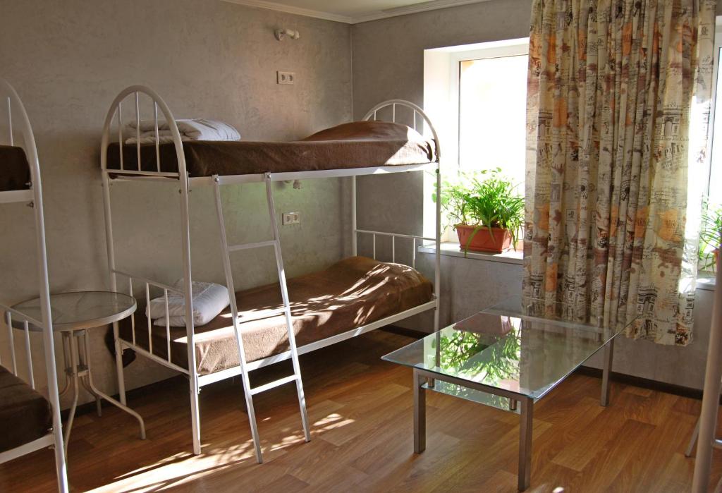 Postel nebo postele na pokoji v ubytování Sweetdream Hostel