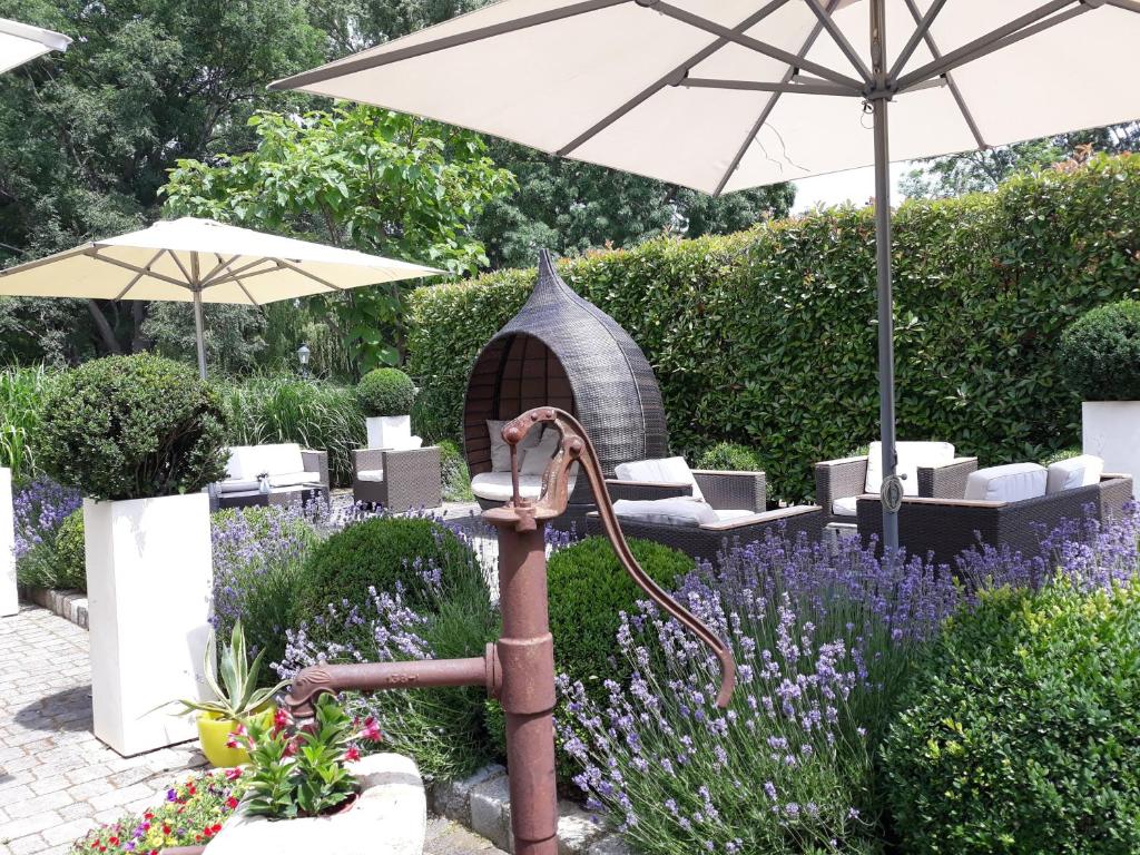 Vonkajšia záhrada v ubytovaní BIRKENHOF GOLS - B & B - Wohlfühl Hotel mit Wochenend-Restaurant