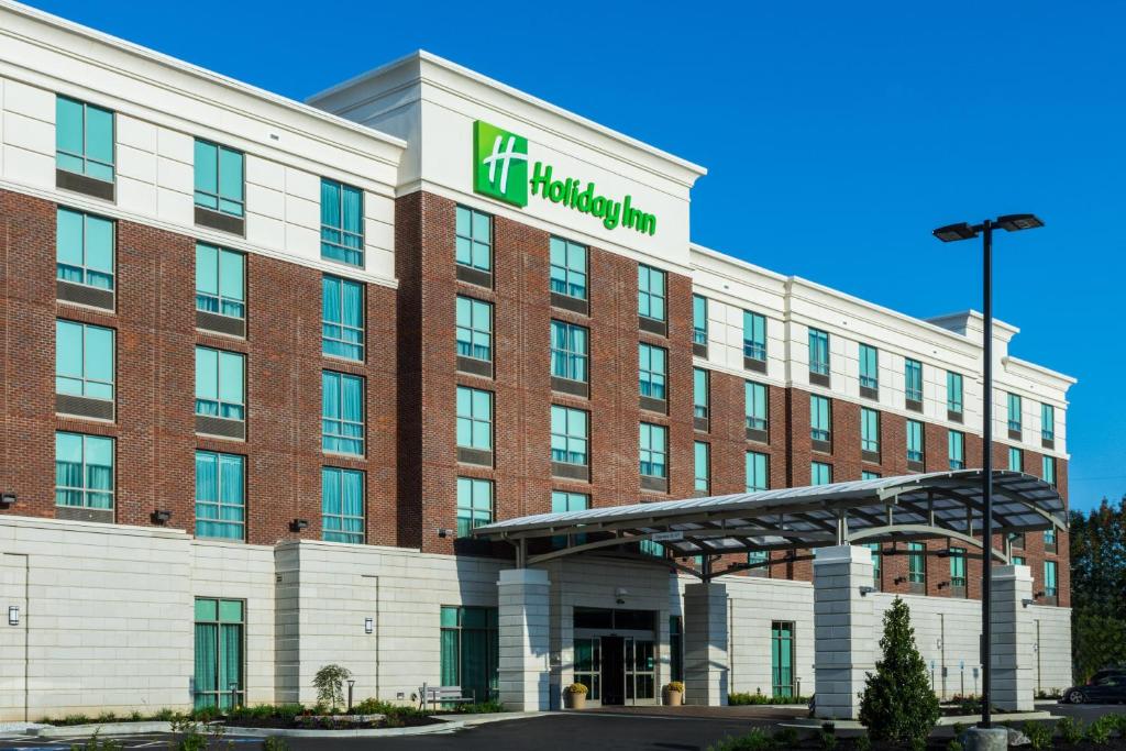 una representación de la parte delantera de un hotel en Holiday Inn Lexington - Hamburg, an IHG Hotel en Lexington